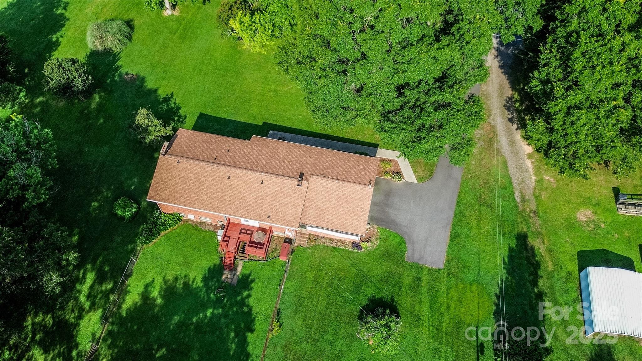 615 Bell Farm Road Statesville, NC 28625 - Photo 9 of 46 an aerial view of a house with pool