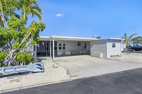a house with a tree in front