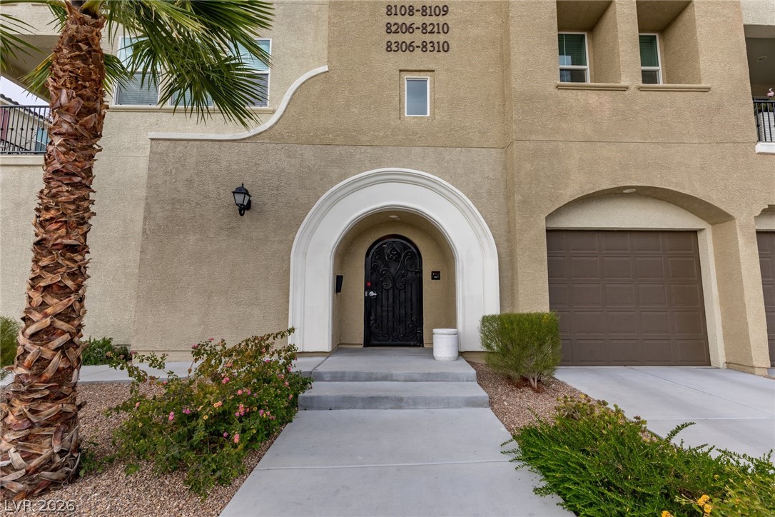 2555 Hampton Road, Unit 8206 Henderson, NV 89052 - Photo 33 of 35 This captivating residence presents a welcoming facade with a graceful arched entry.