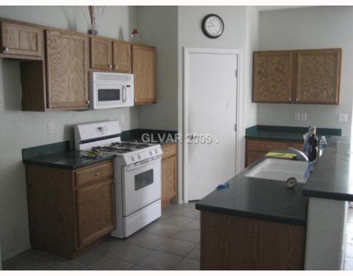 6008 Crumbling Ridge Street Henderson, NV 89011 - Photo 4 of 12 Kitchen.