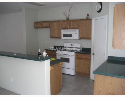 6008 Crumbling Ridge Street Henderson, NV 89011 - Photo 5 of 12 Kitchen.