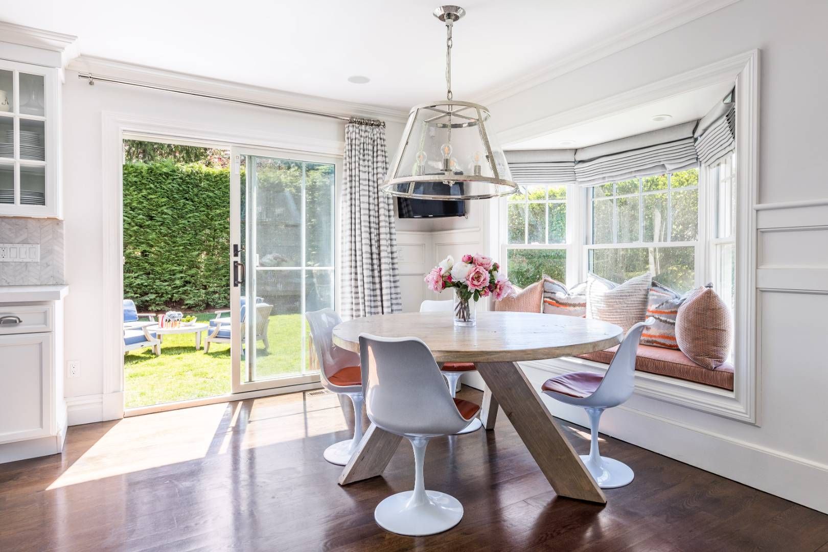 34 Sherrill Road East Hampton, NY 11937 - Photo 8 of 21 a dining room with furniture a chandelier and wooden floor