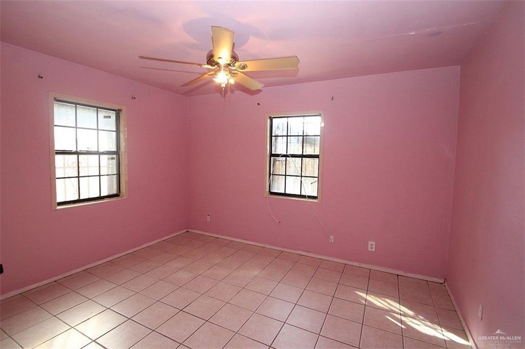3738 Rey David Drive Brownsville, TX 78521 - Photo 7 of 12 a view of an empty room with a window