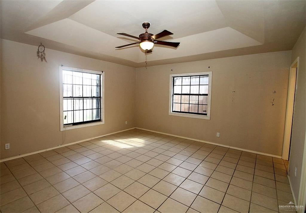 3738 Rey David Drive Brownsville, TX 78521 - Photo 8 of 12 a view of an empty room and window