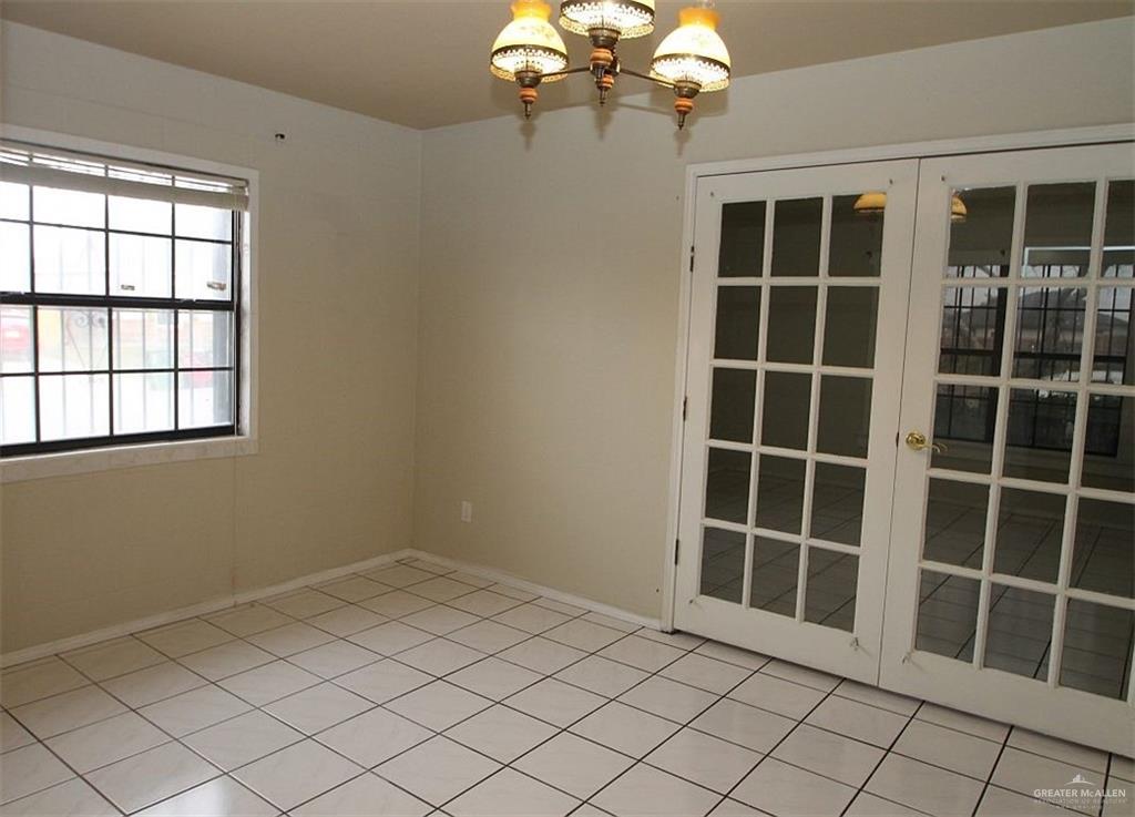 3738 Rey David Drive Brownsville, TX 78521 - Photo 9 of 12 a view of empty room with windows