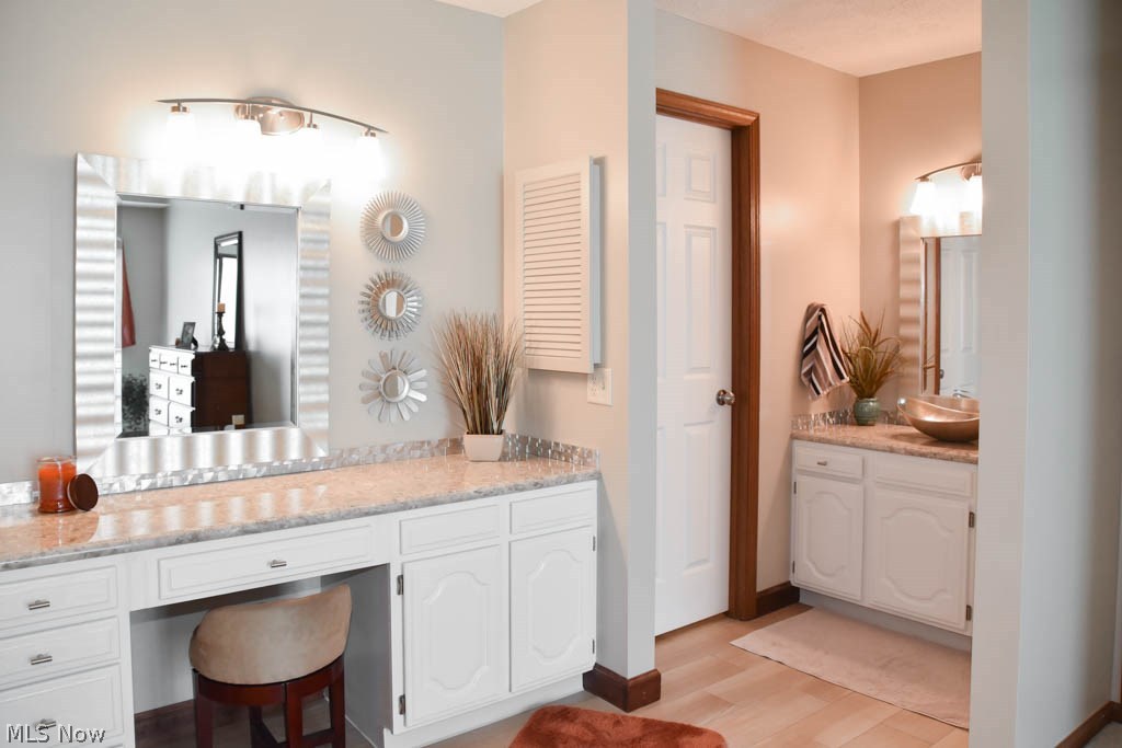 2883 Charing Cross Road Northwest Canton, OH 44708 - Photo 12 of 27 The master bath has two vanities.