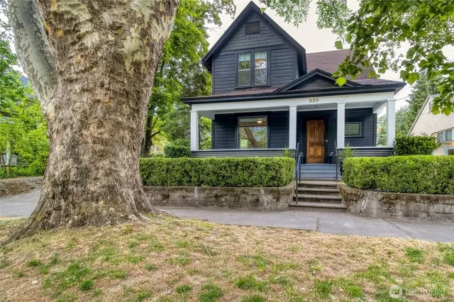 front view of a house with a yard