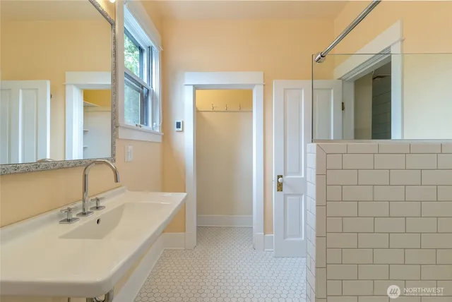 a view of an empty room with a window