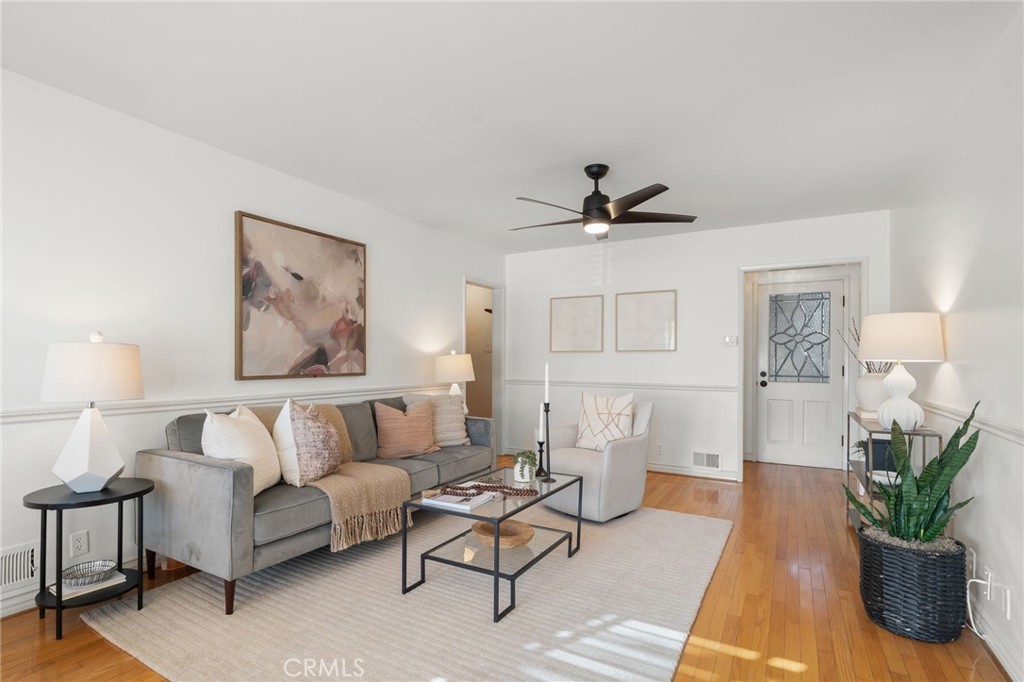 2027 East Appleton Street, Unit 1 Long Beach, CA 90803 - Photo 2 of 24 a living room with furniture and a potted plant