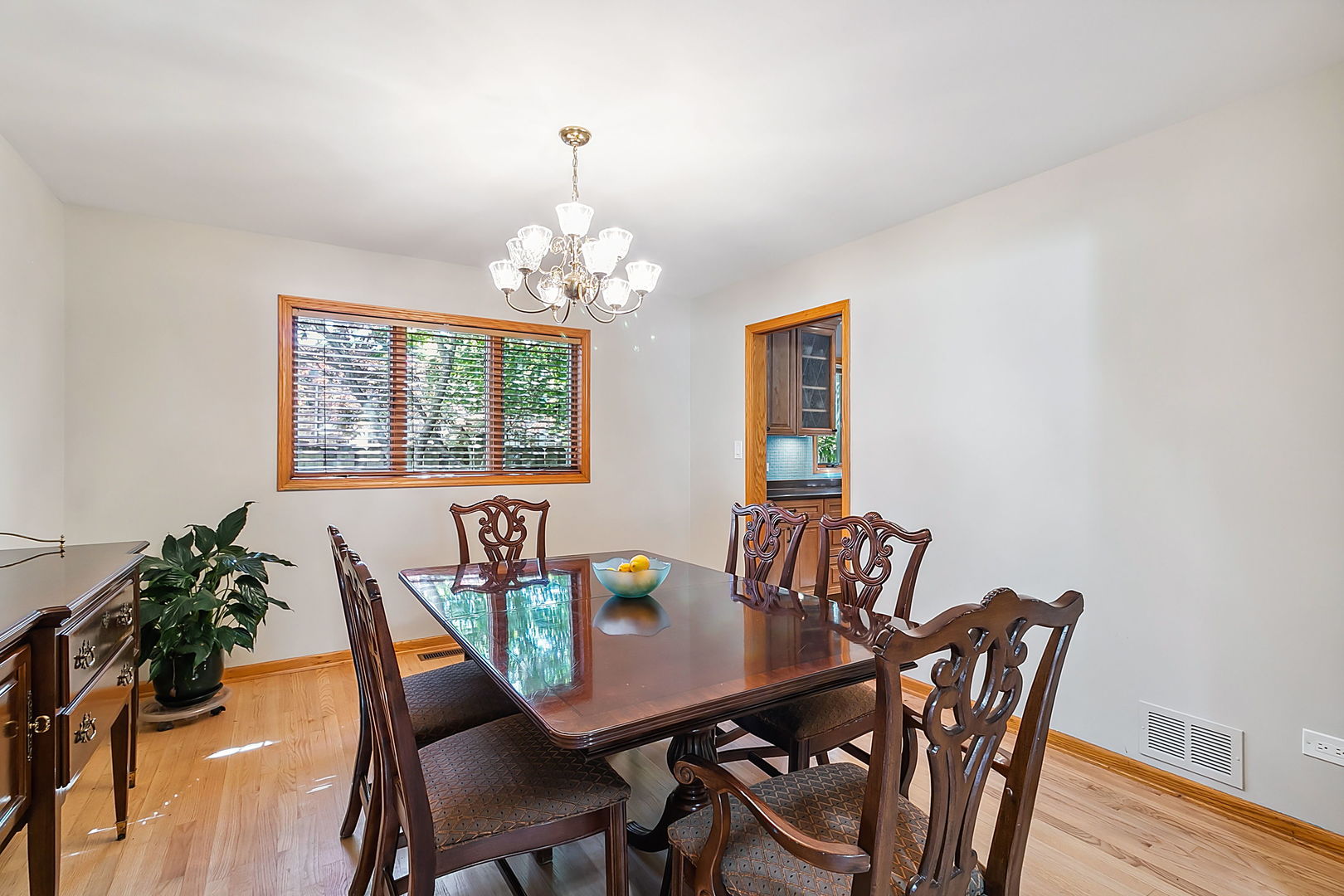 421 Herrick Road Riverside, IL 60546 - Photo 11 of 41 a view of a dining room with furniture and chandelier