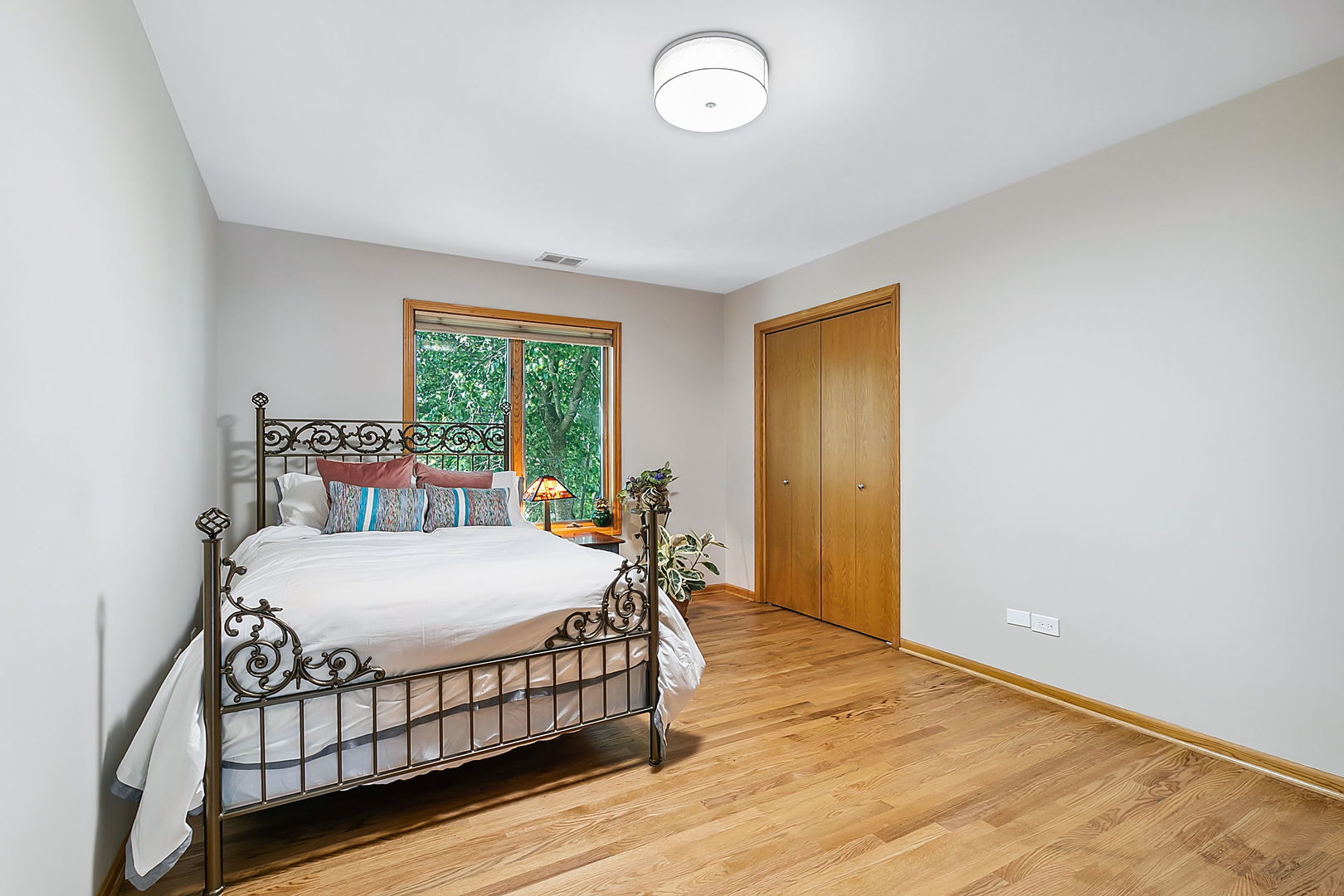 421 Herrick Road Riverside, IL 60546 - Photo 20 of 41 a bedroom with a bed and window