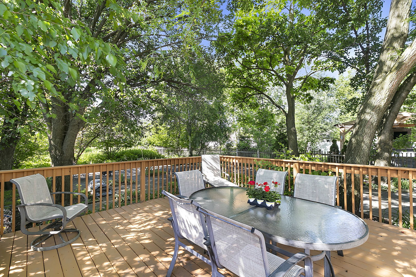 421 Herrick Road Riverside, IL 60546 - Photo 27 of 41 a balcony with wooden floor and outdoor seating