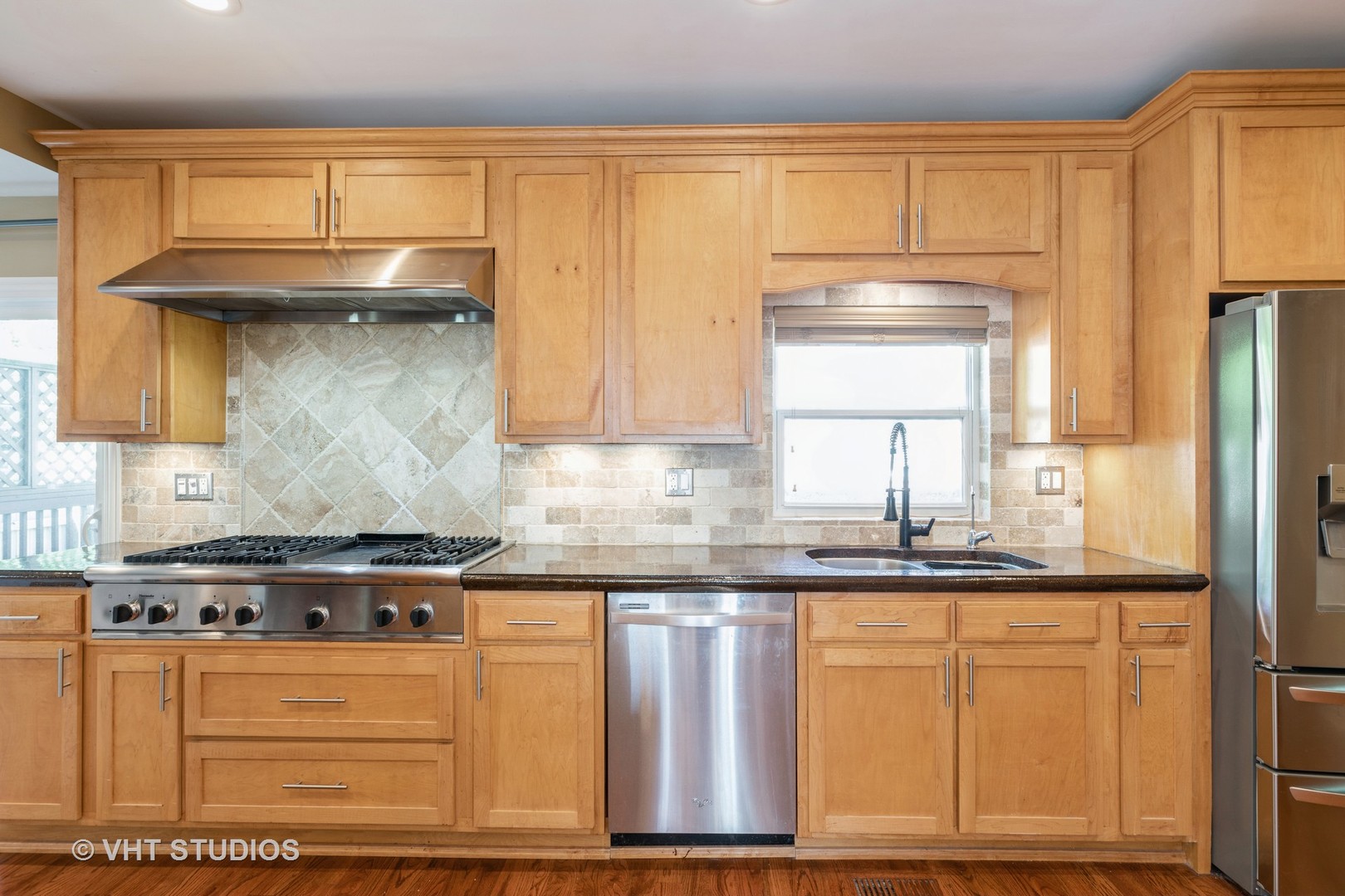 1438 Ridge Road Homewood, IL 60430 - Photo 11 of 35 a kitchen with granite countertop a stove a sink and a refrigerator
