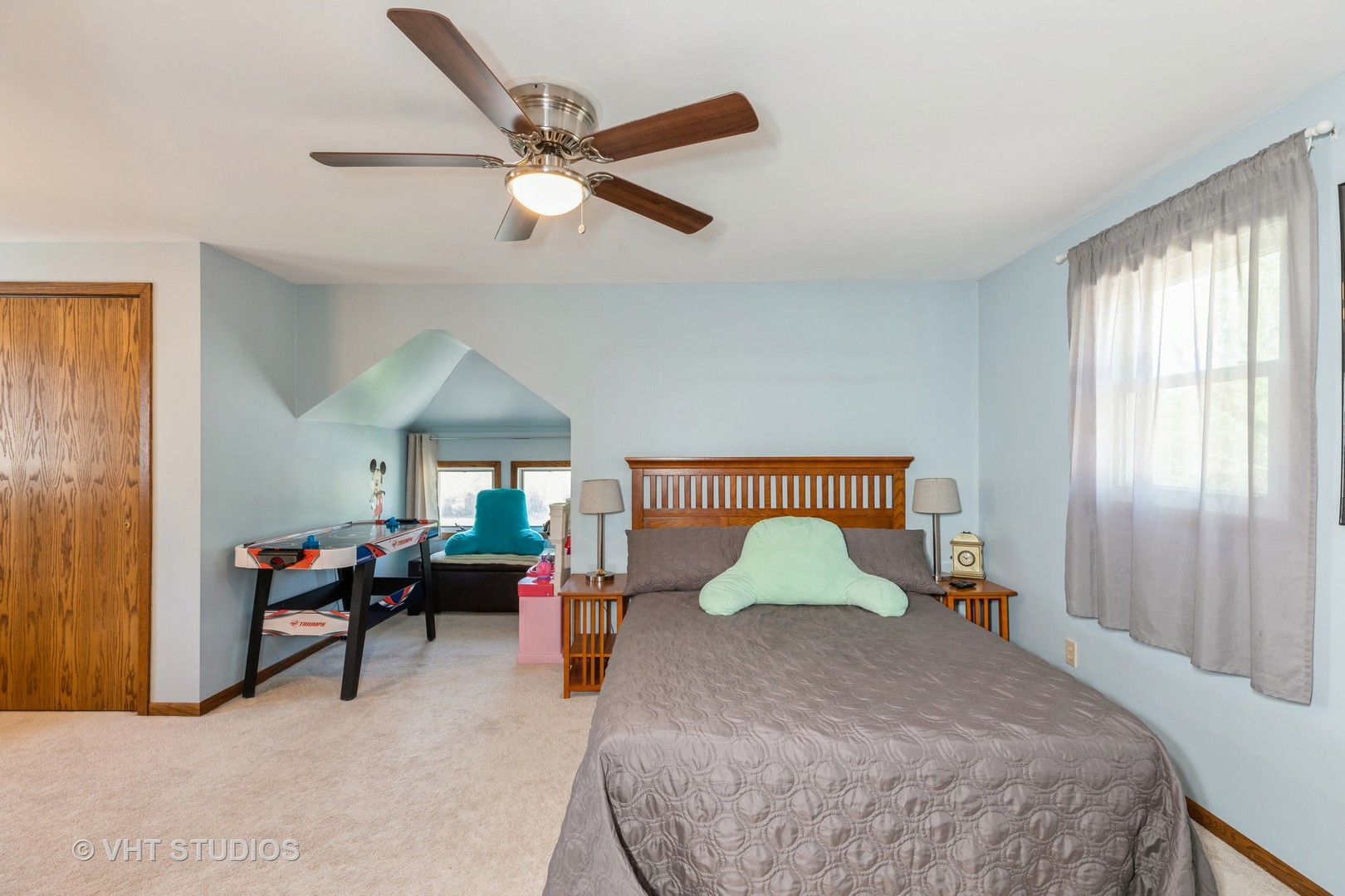 1438 Ridge Road Homewood, IL 60430 - Photo 15 of 35 a bedroom with a bed and a chandelier