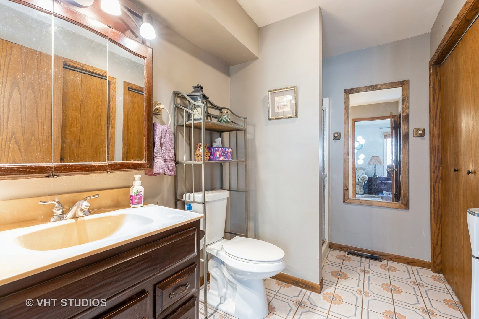 1438 Ridge Road Homewood, IL 60430 - Photo 28 of 35 a bathroom with a sink toilet and shower