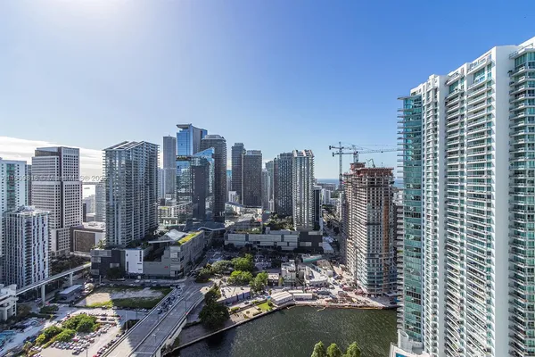 a view of city and a tall buildings