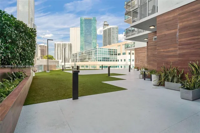 a view of balcony and floor to ceiling window