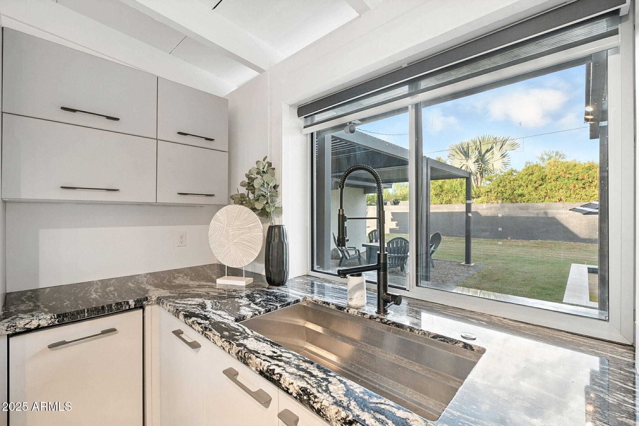 5809 North 10th Place Phoenix, AZ 85014 - Photo 16 of 81 Kitchen window to backyard