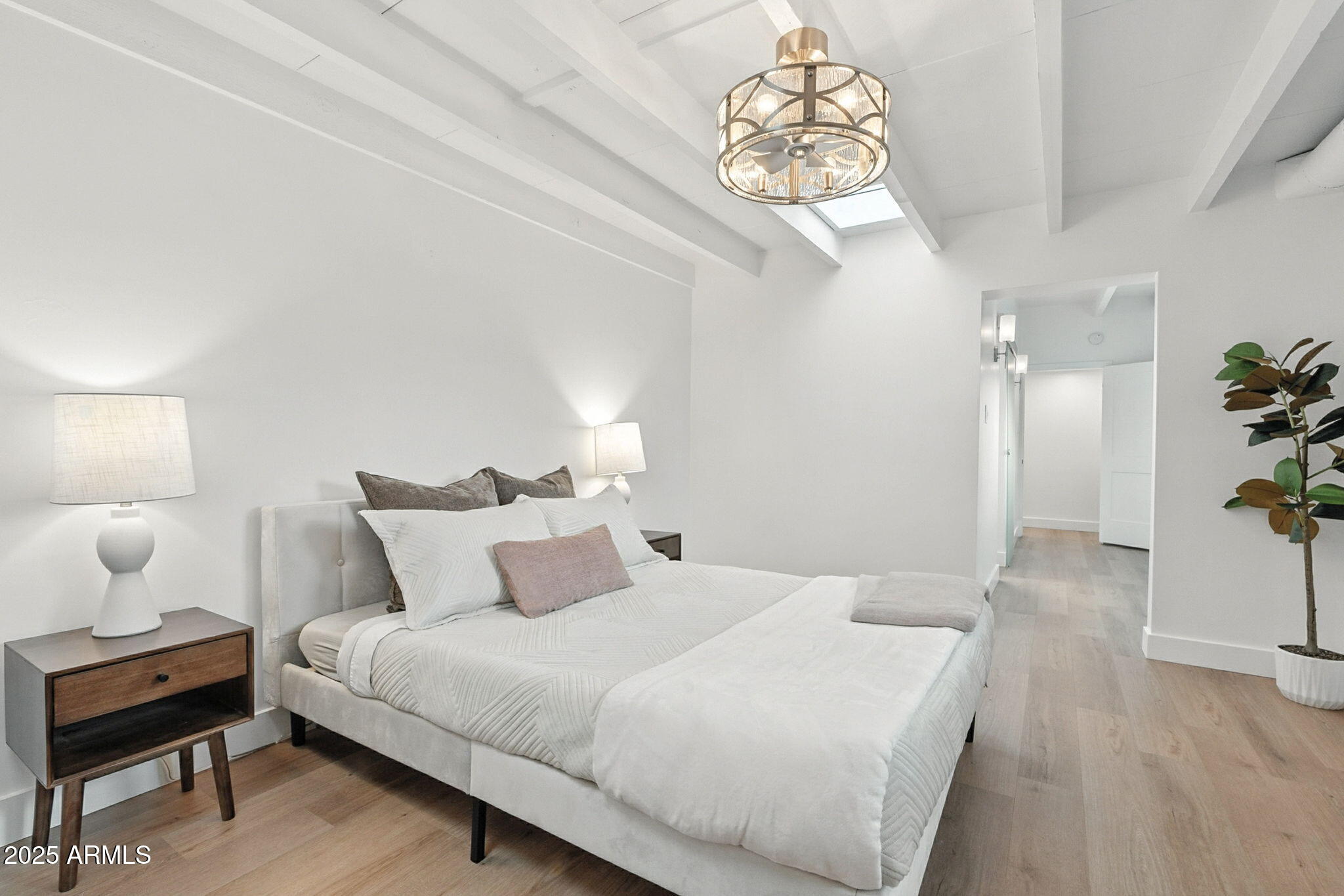 5809 North 10th Place Phoenix, AZ 85014 - Photo 23 of 81 a bedroom with a bed and a window