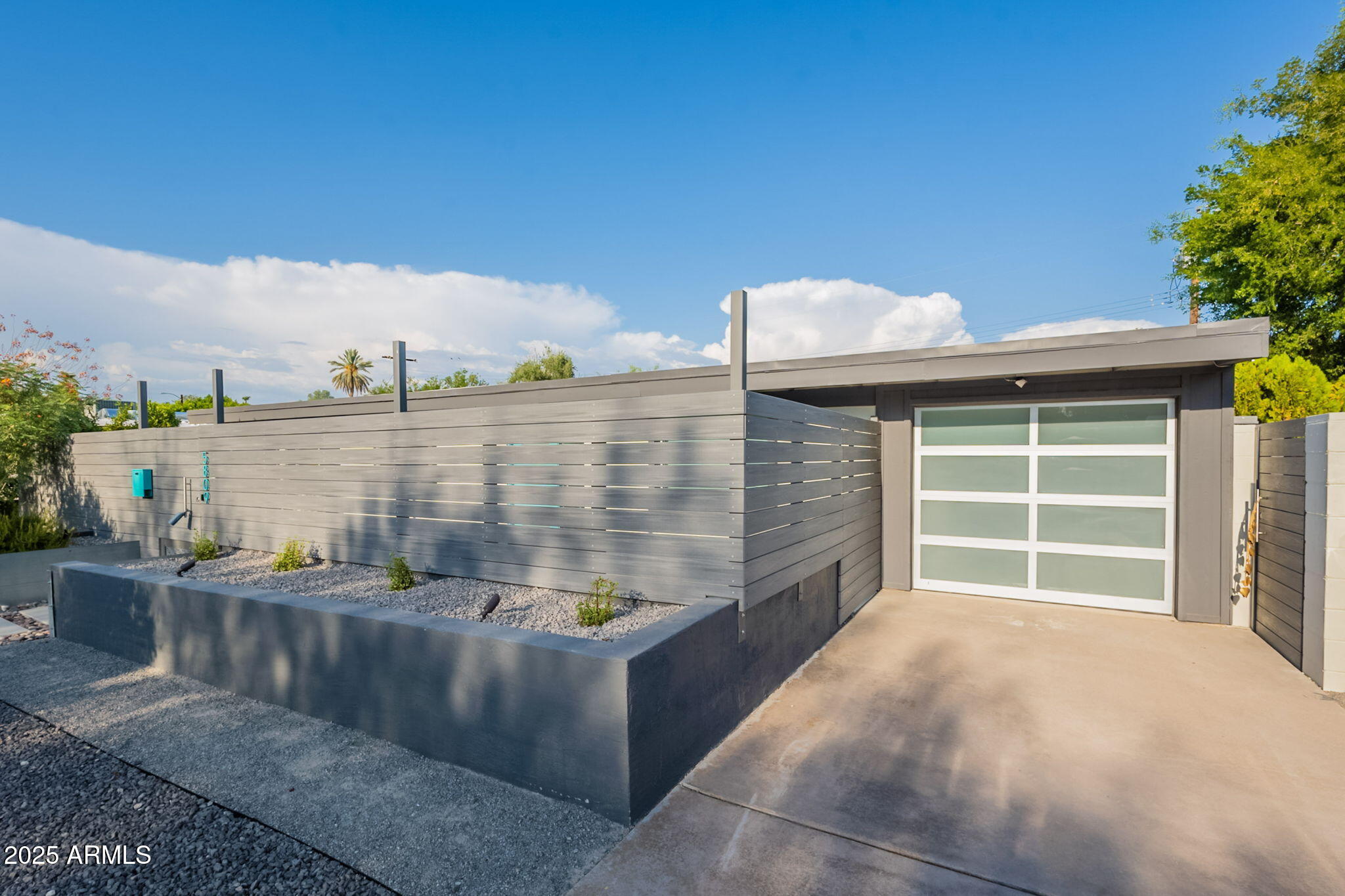 5809 North 10th Place Phoenix, AZ 85014 - Photo 6 of 81 a view of a balcony with table and chairs and potted plants
