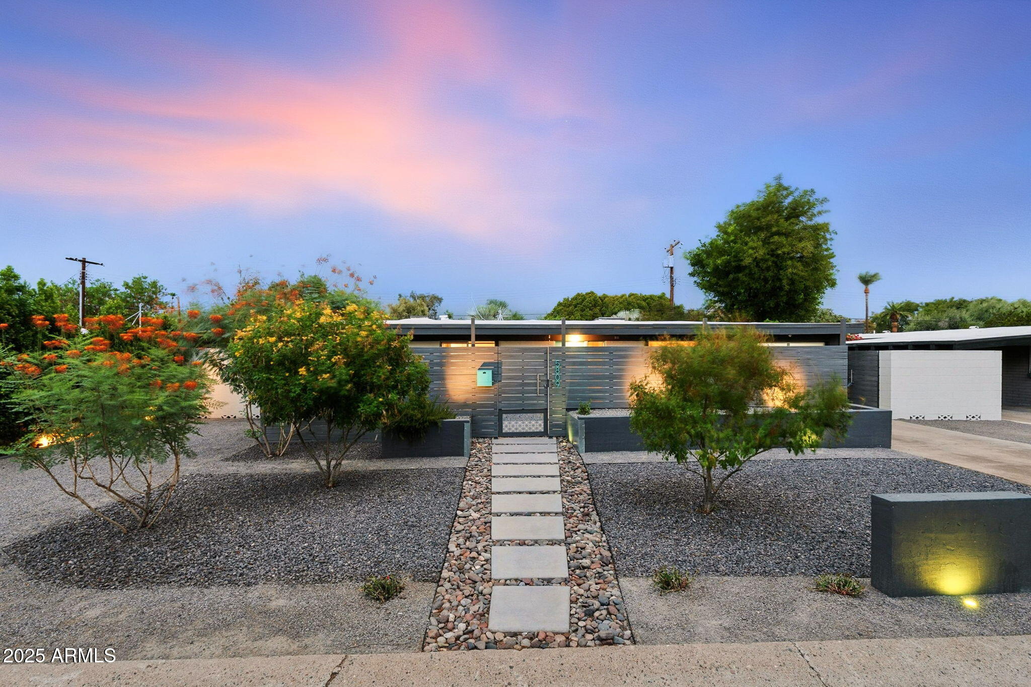 5809 North 10th Place Phoenix, AZ 85014 - Photo 63 of 81 a view of a lake with a garden