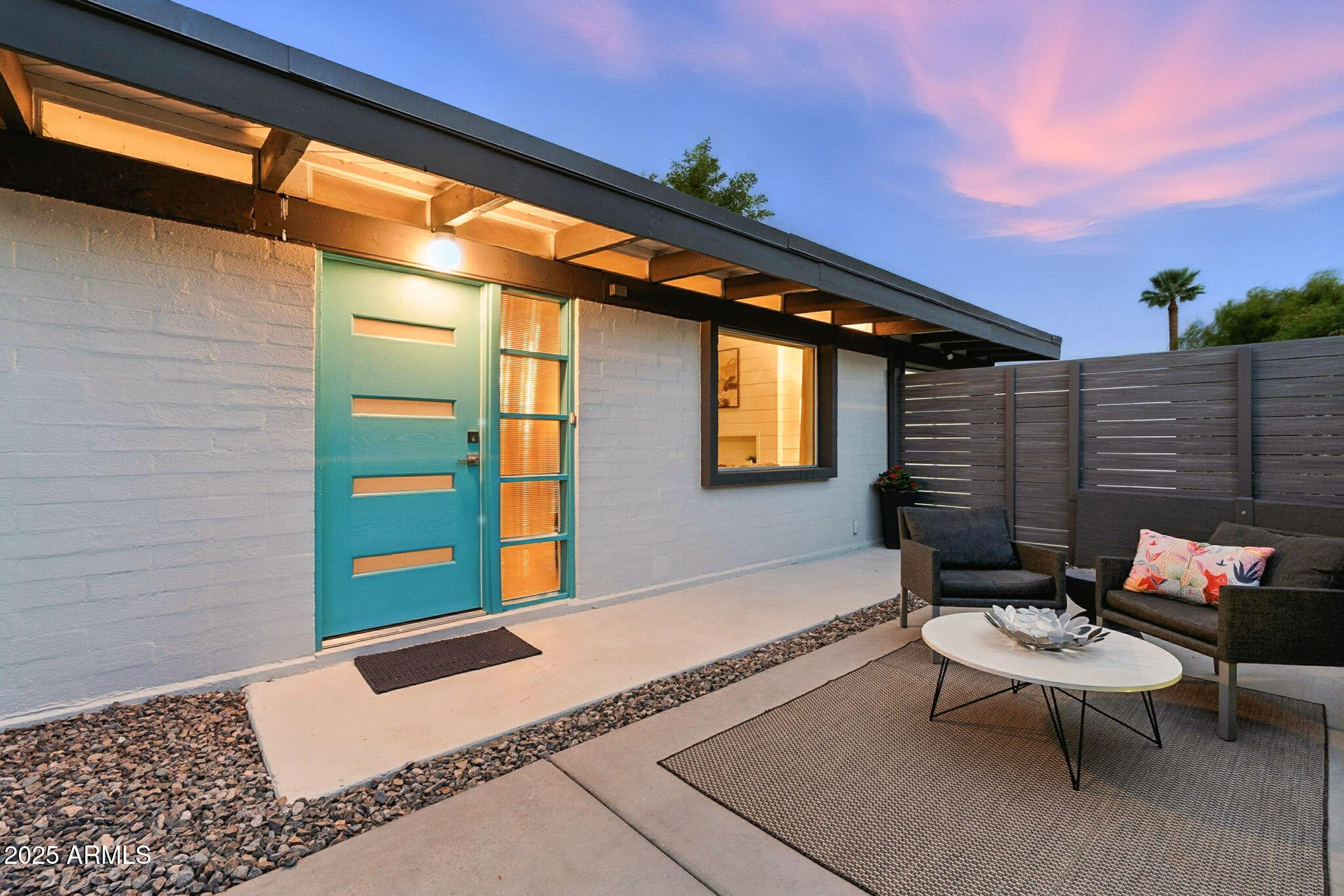 5809 North 10th Place Phoenix, AZ 85014 - Photo 65 of 81 a backyard of a house with table and chairs
