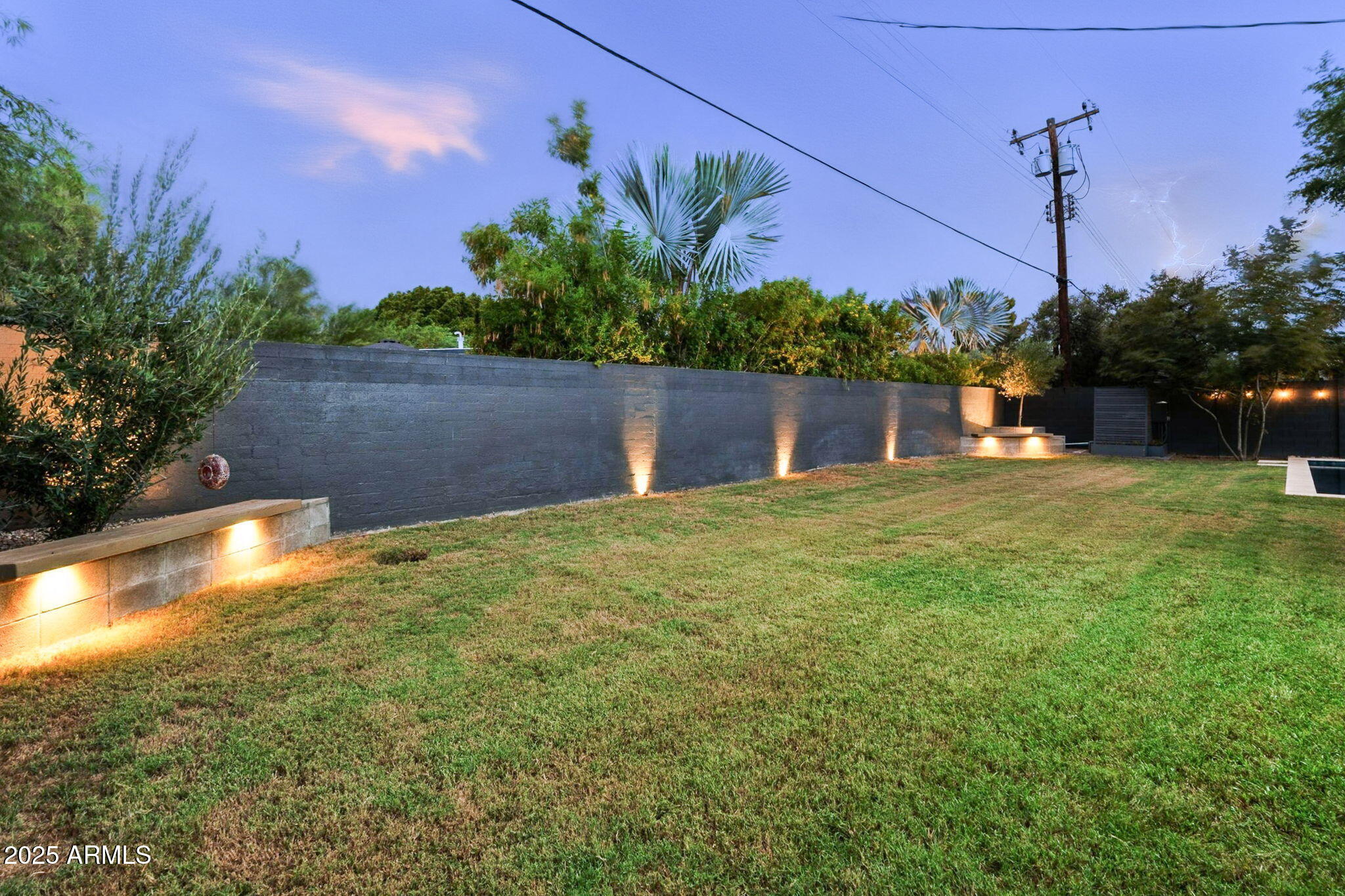 5809 North 10th Place Phoenix, AZ 85014 - Photo 68 of 81 a backyard of a house with lots of green space