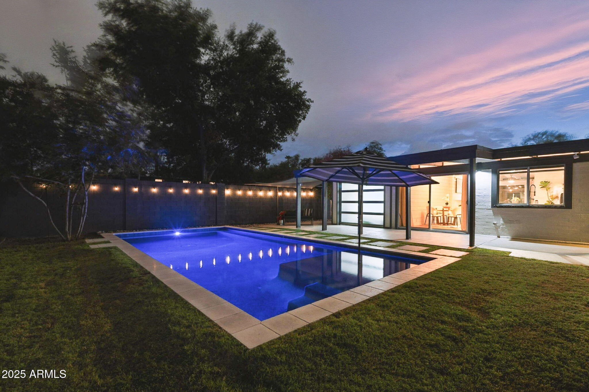 5809 North 10th Place Phoenix, AZ 85014 - Photo 76 of 81 a view of swimming pool with outdoor seating