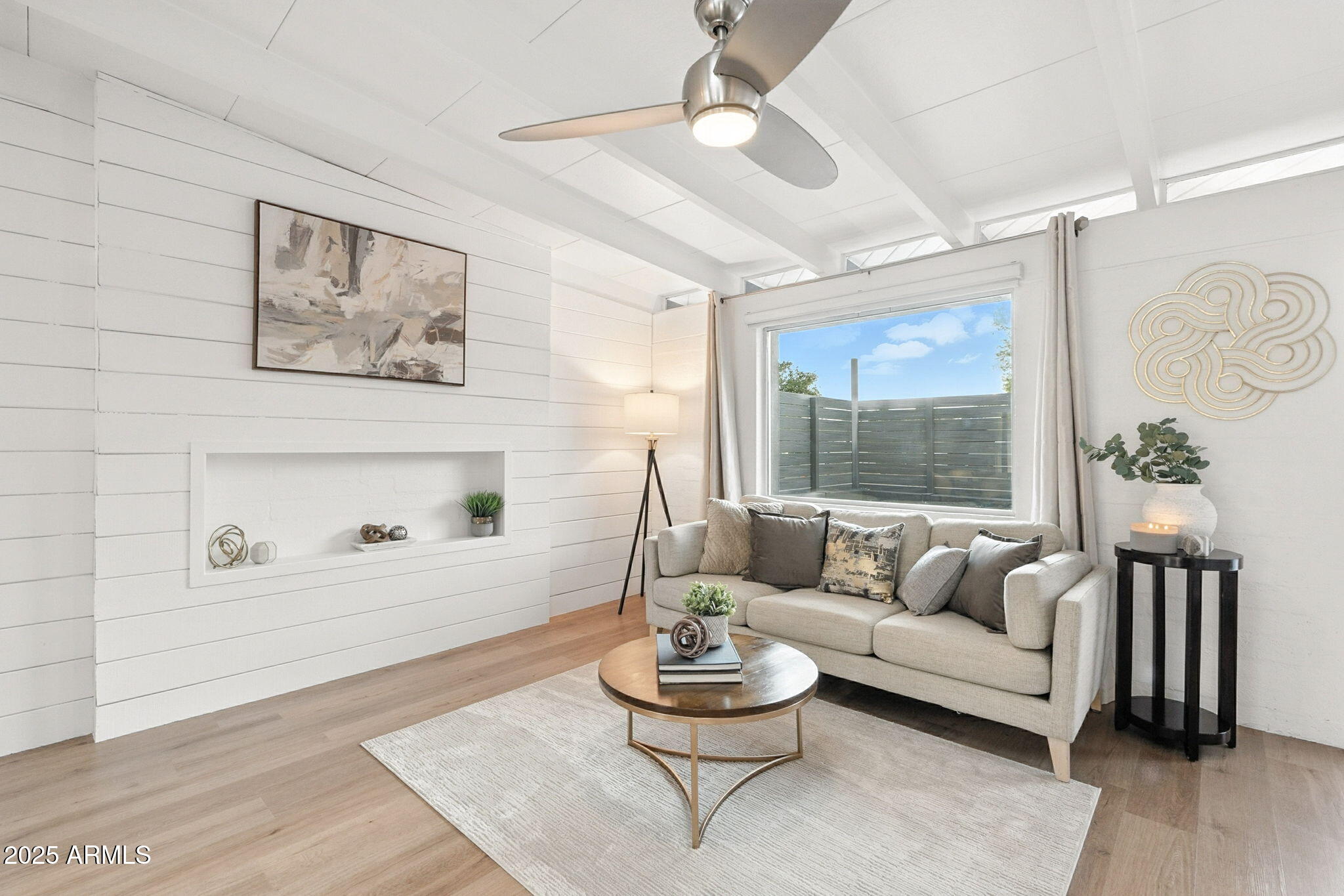 5809 North 10th Place Phoenix, AZ 85014 - Photo 9 of 81 a living room with furniture and a wooden floor