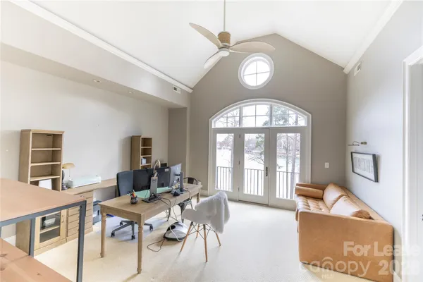 a bathroom with a tub sink and shower
