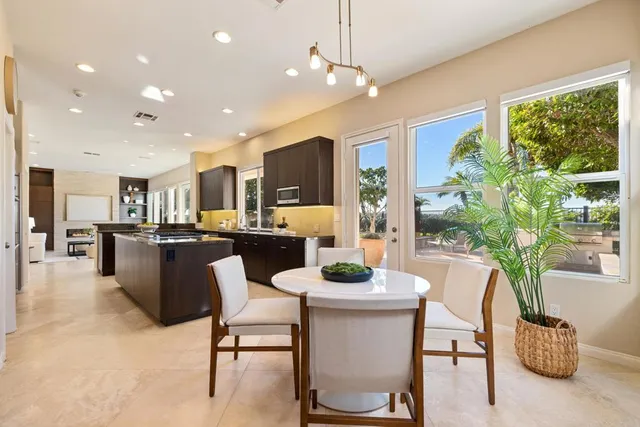 a view of hall way with furniture