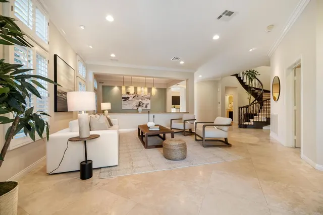 a kitchen with a table and chairs in it