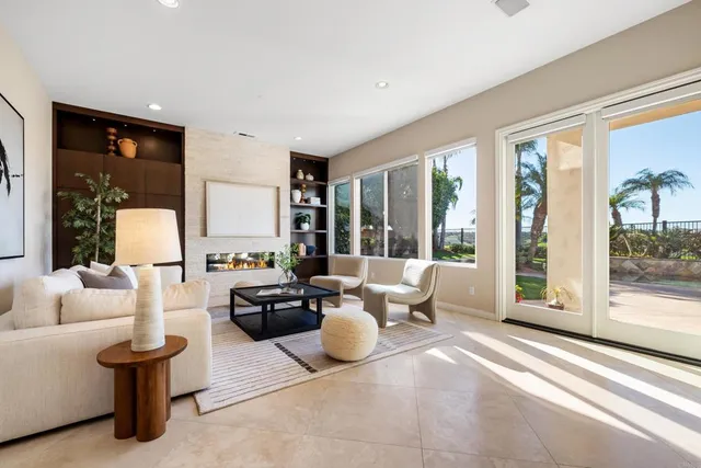 a table with a vase and flowers on it