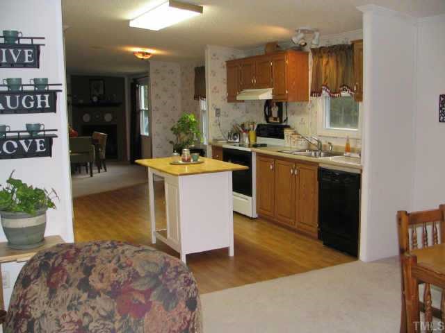 6015 Applewhite Road Wendell, NC 27591 - Photo 7 of 10 Bright and open Kitchen with Island