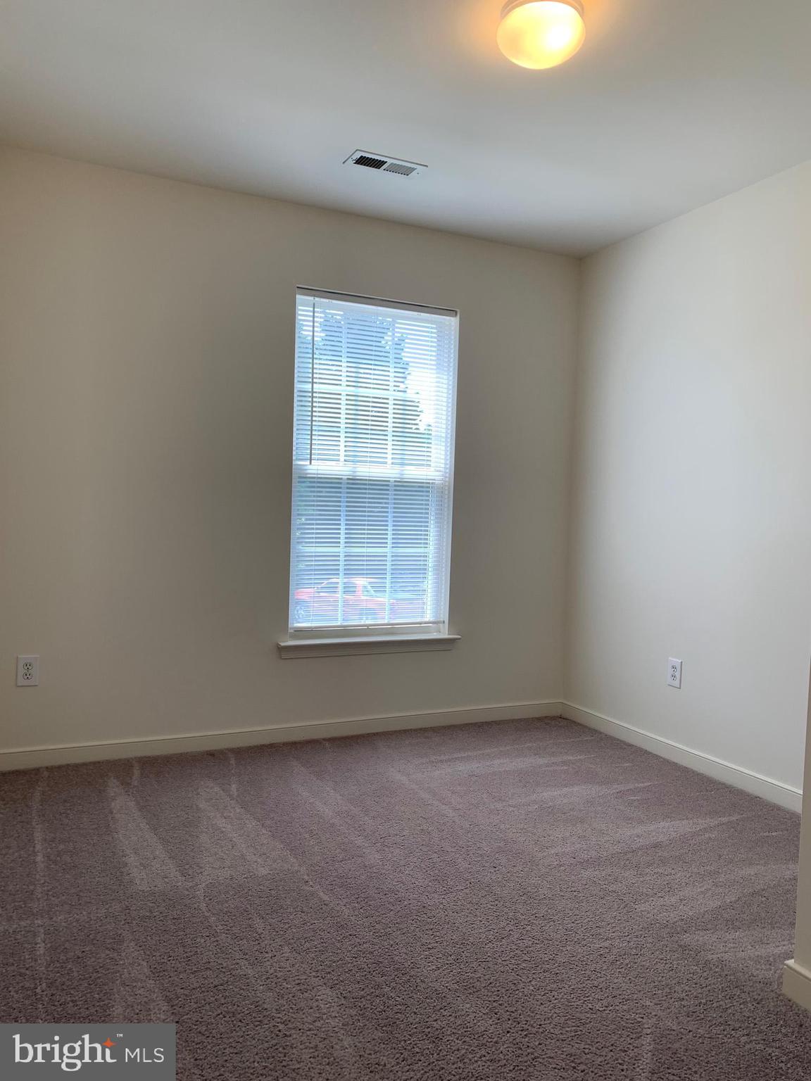 208 Torbert Loop Stafford, VA 22554 - Photo 13 of 16 an empty room with a window
