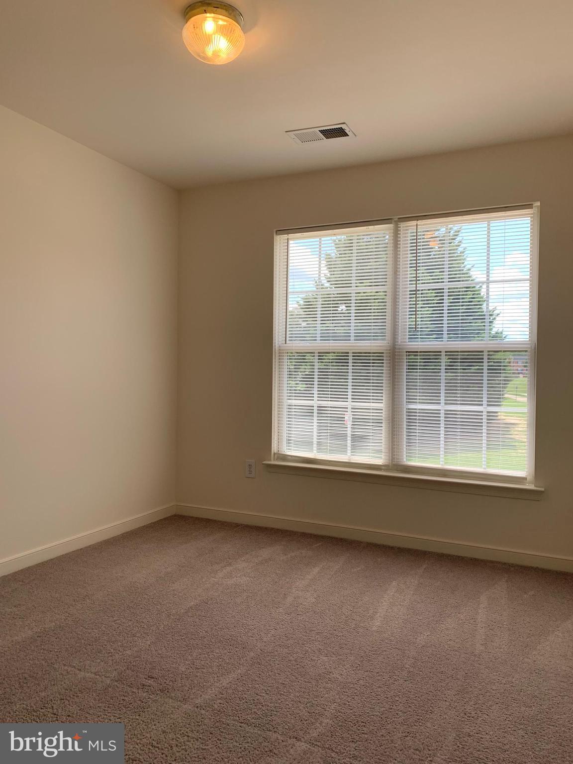 208 Torbert Loop Stafford, VA 22554 - Photo 14 of 16 an empty room with a window