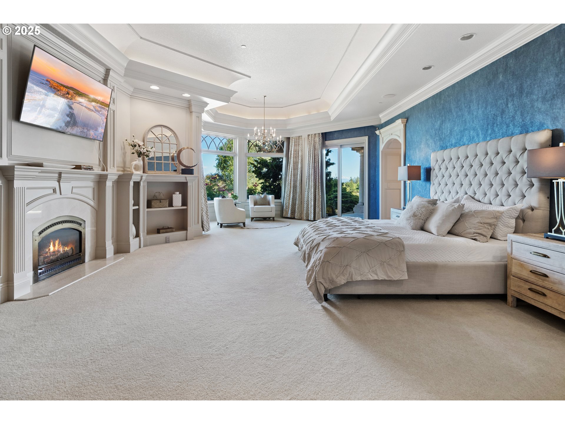 21121 Northwest 17th Court Ridgefield, WA 98642 - Photo 20 of 48 a living room with furniture a fireplace and a flat screen tv