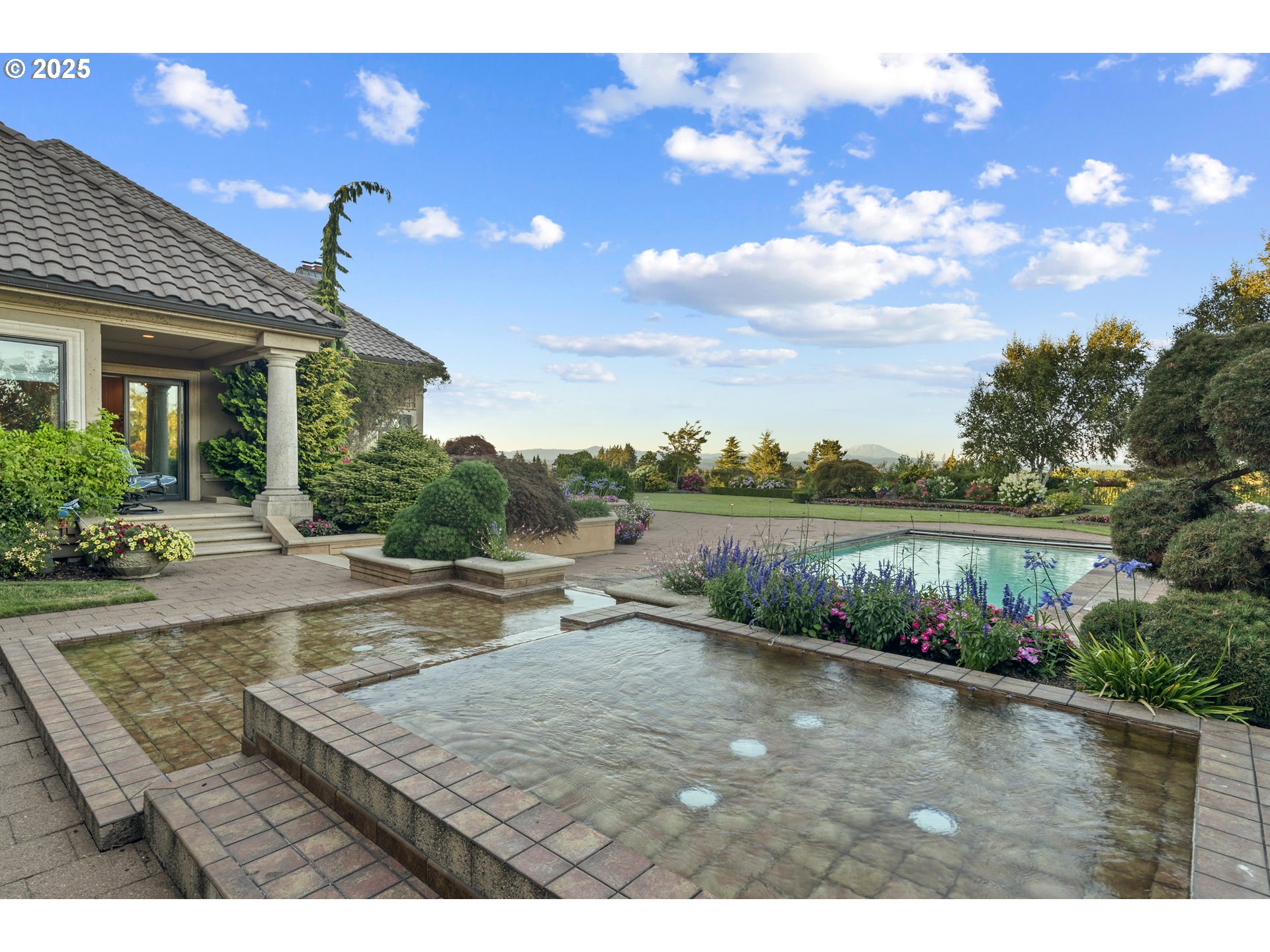 21121 Northwest 17th Court Ridgefield, WA 98642 - Photo 39 of 48 a view of a swimming pool with a patio