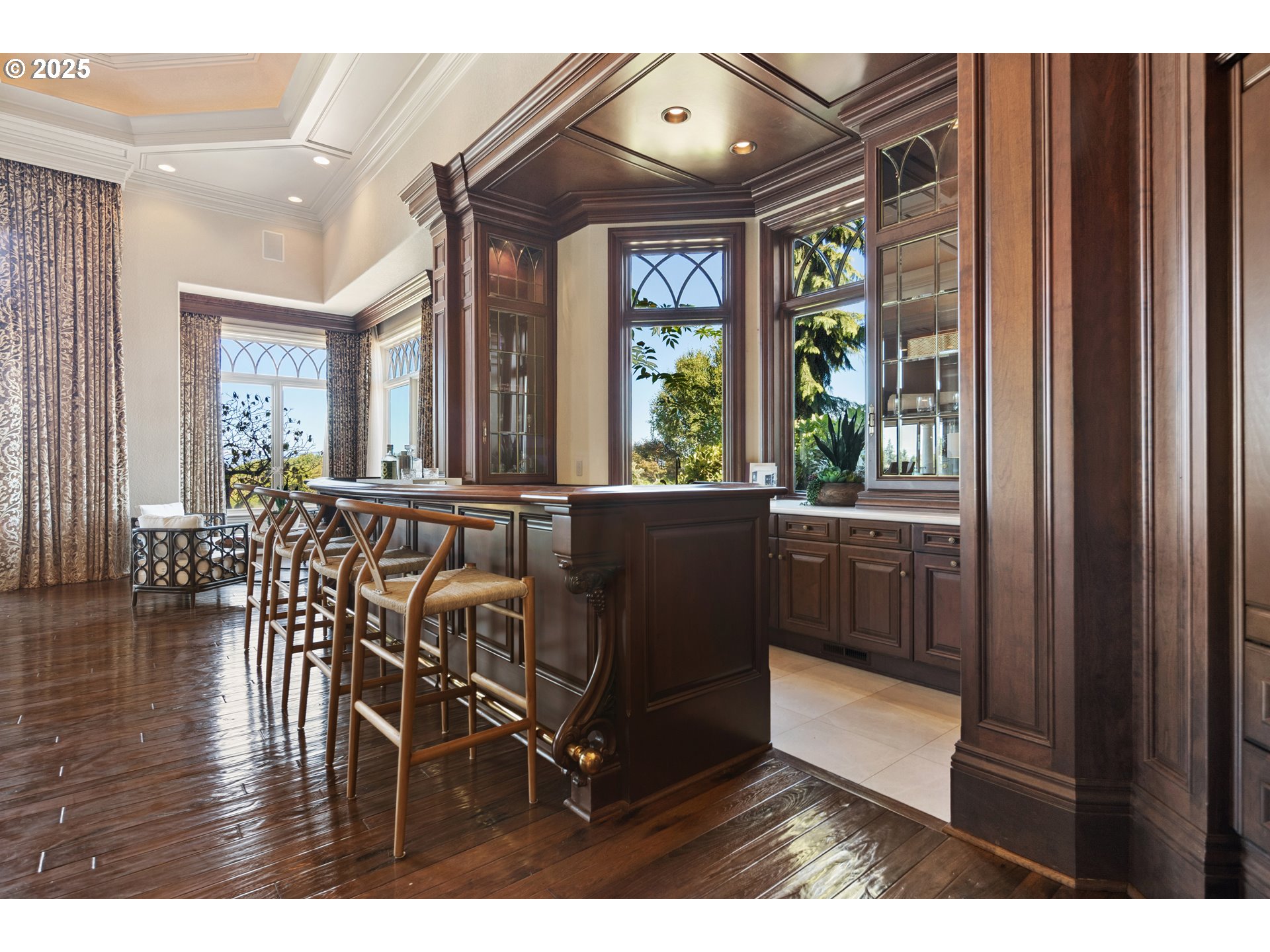 21121 Northwest 17th Court Ridgefield, WA 98642 - Photo 10 of 48 a view of a dining room with furniture window and wooden floor