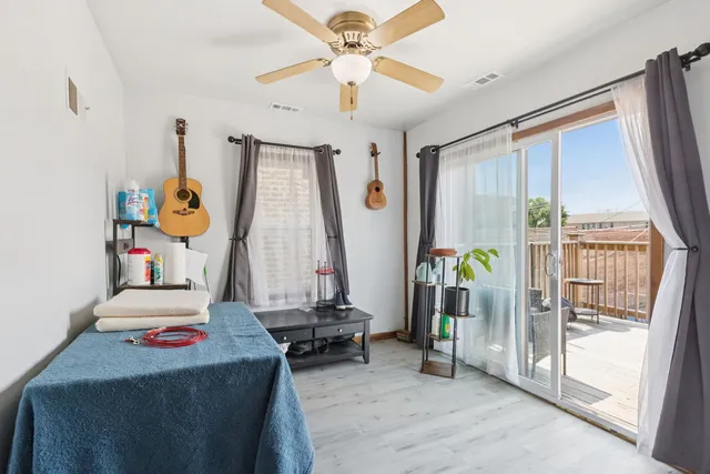 a view of balcony with furniture