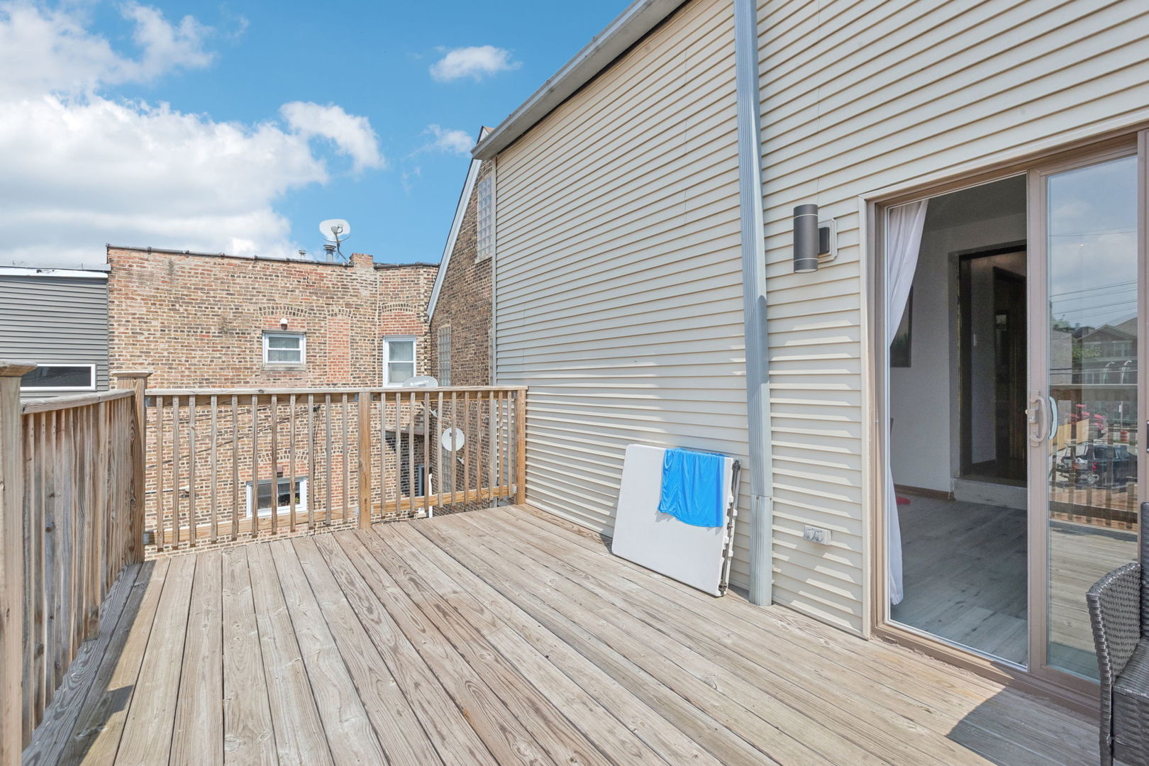 3234 South Princeton Avenue Chicago, IL 60616 - Photo 26 of 56 a view of a house with a deck