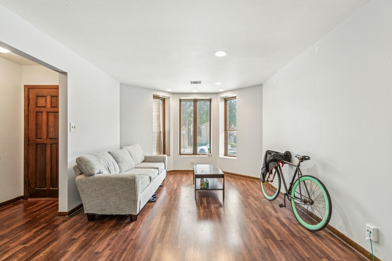 3234 South Princeton Avenue Chicago, IL 60616 - Photo 29 of 56 a living room with furniture and a window