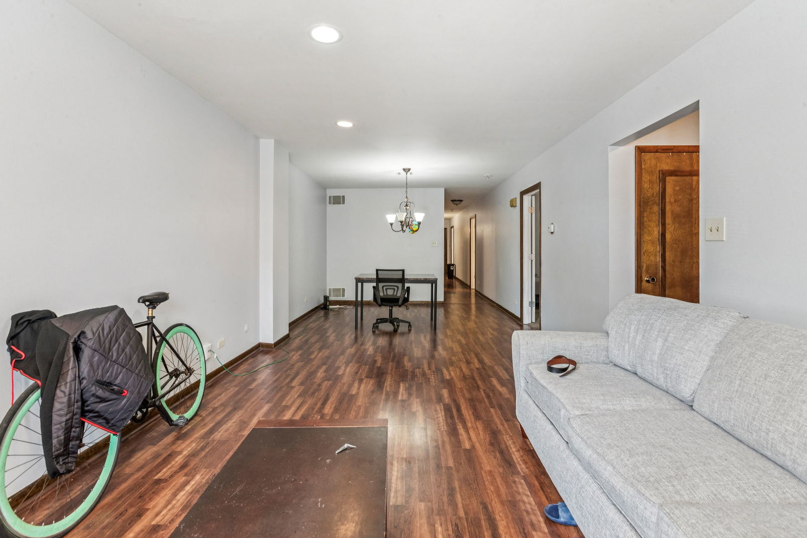 3234 South Princeton Avenue Chicago, IL 60616 - Photo 33 of 56 a view of a livingroom with furniture and gym equipment