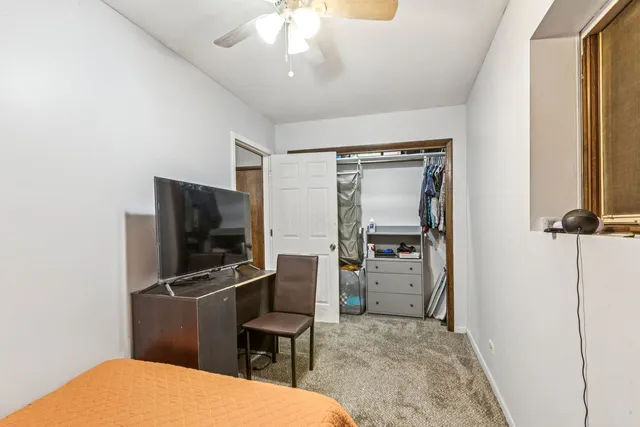 a view of game room with window and furniture