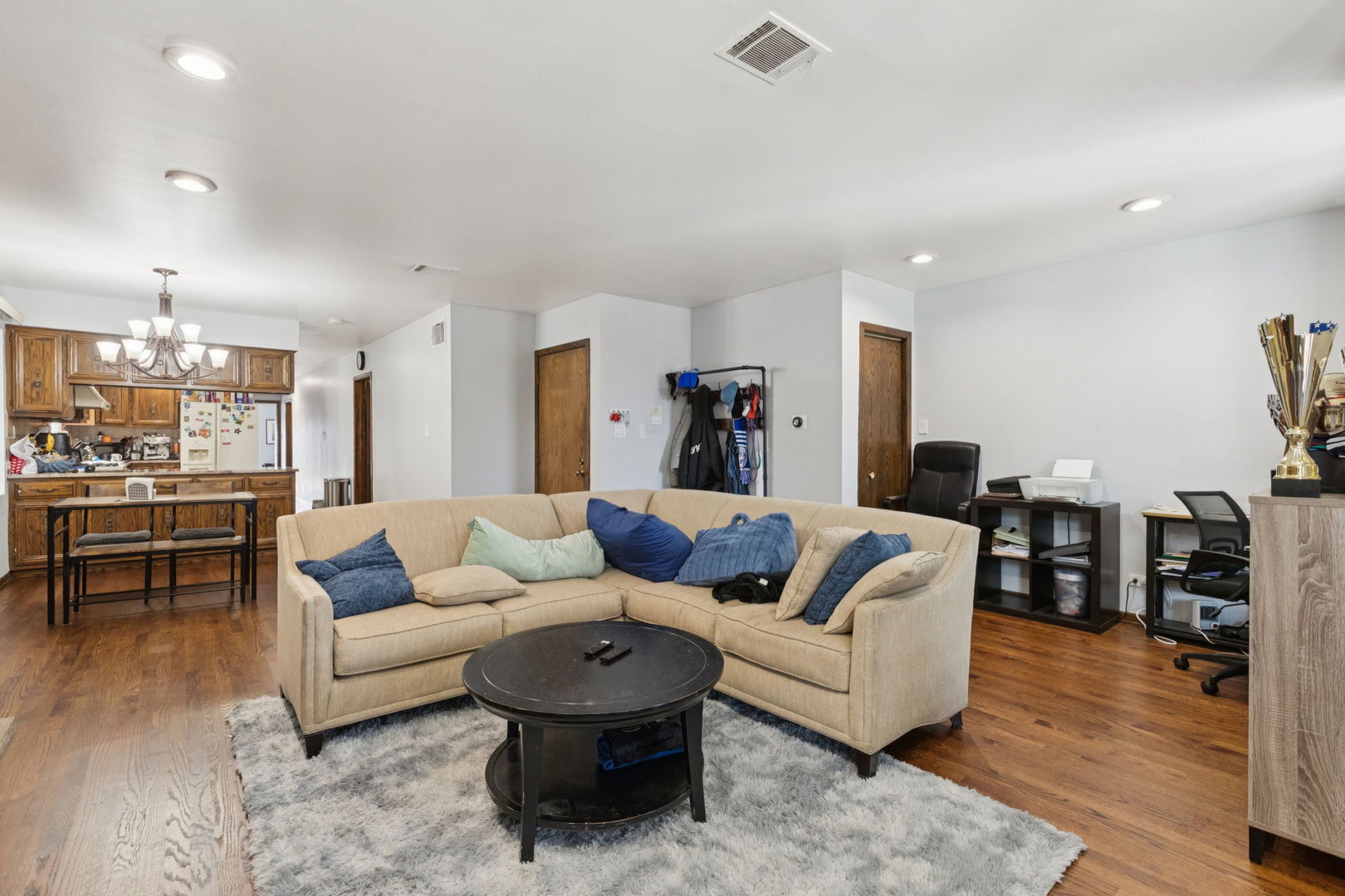 3234 South Princeton Avenue Chicago, IL 60616 - Photo 8 of 56 a living room with furniture and wooden floor