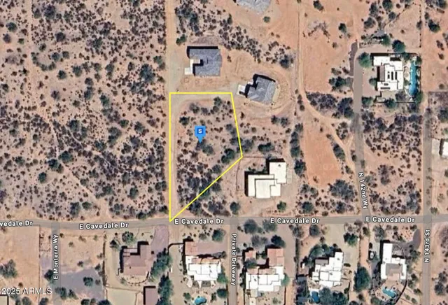 a picture of aerial view of a brick building