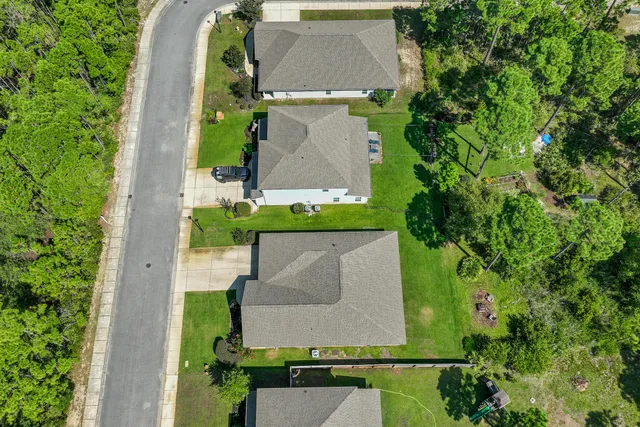 a view of a yard with an outdoor space