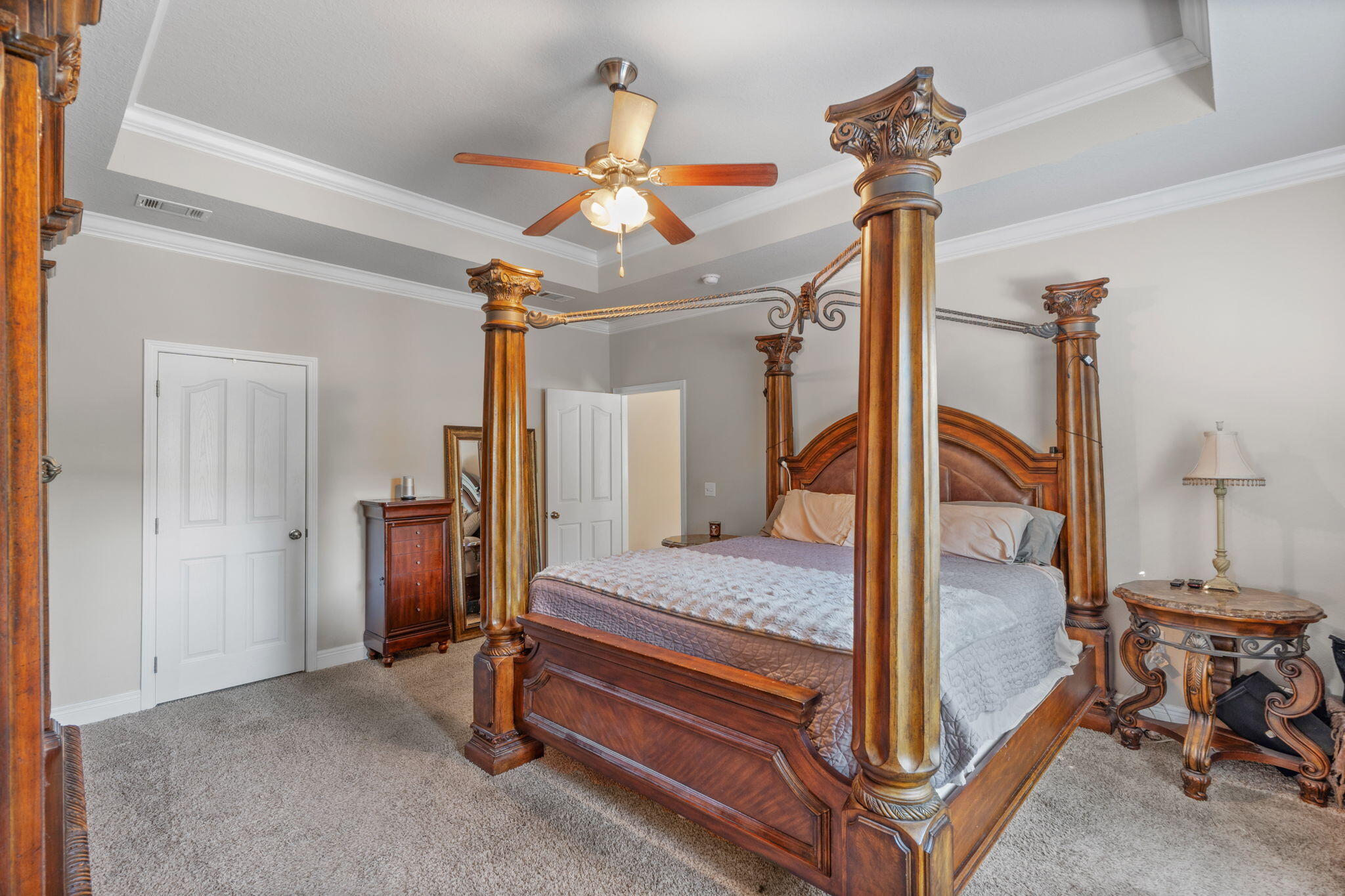129 Mussett Bayou Court Santa Rosa Beach, FL 32459 - Photo 24 of 54 a bedroom with a bed and a chandelier