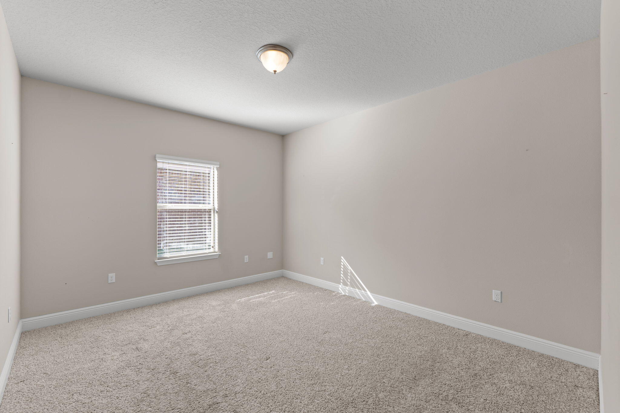 129 Mussett Bayou Court Santa Rosa Beach, FL 32459 - Photo 33 of 54 an empty room with a window