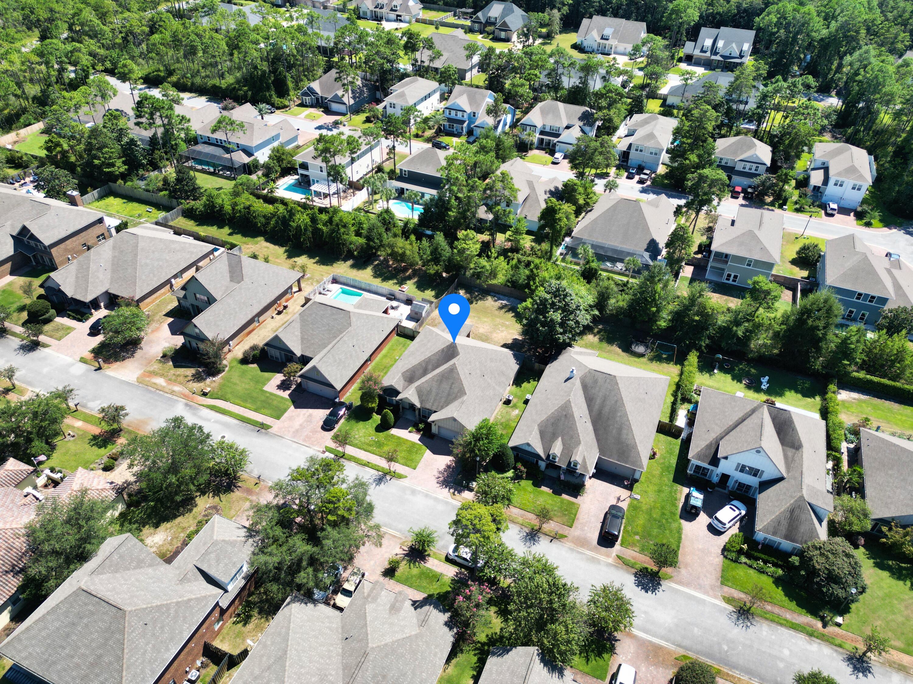 129 Mussett Bayou Court Santa Rosa Beach, FL 32459 - Photo 50 of 54 an aerial view of residential houses with outdoor space